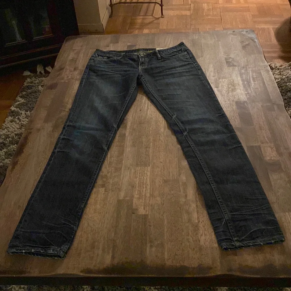 All Saints Spitalfields Jack’s Place skinny dark blue jeans from Neiman Marcus